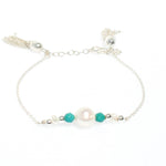 dainty silver pearl tassel bracelet with turquoise detail